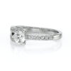 Solitaire en forme de lasso serti de diamants ajouré en or 18 carats