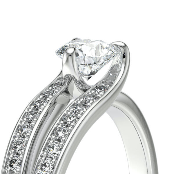 Solitaire en forme de lasso serti de diamants ajouré en or 18 carats