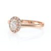 Bague de fiançailles en or rose 18 carats forme ovale avec un diamant ovale entouré de diamants ronds