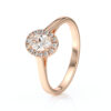 Bague de fiançailles en or rose 18 carats forme ovale avec un diamant ovale entouré de diamants ronds