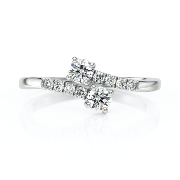 Bague toi et moi accompagnée de diamants ronds de pavage montés sur or blanc 18 carats