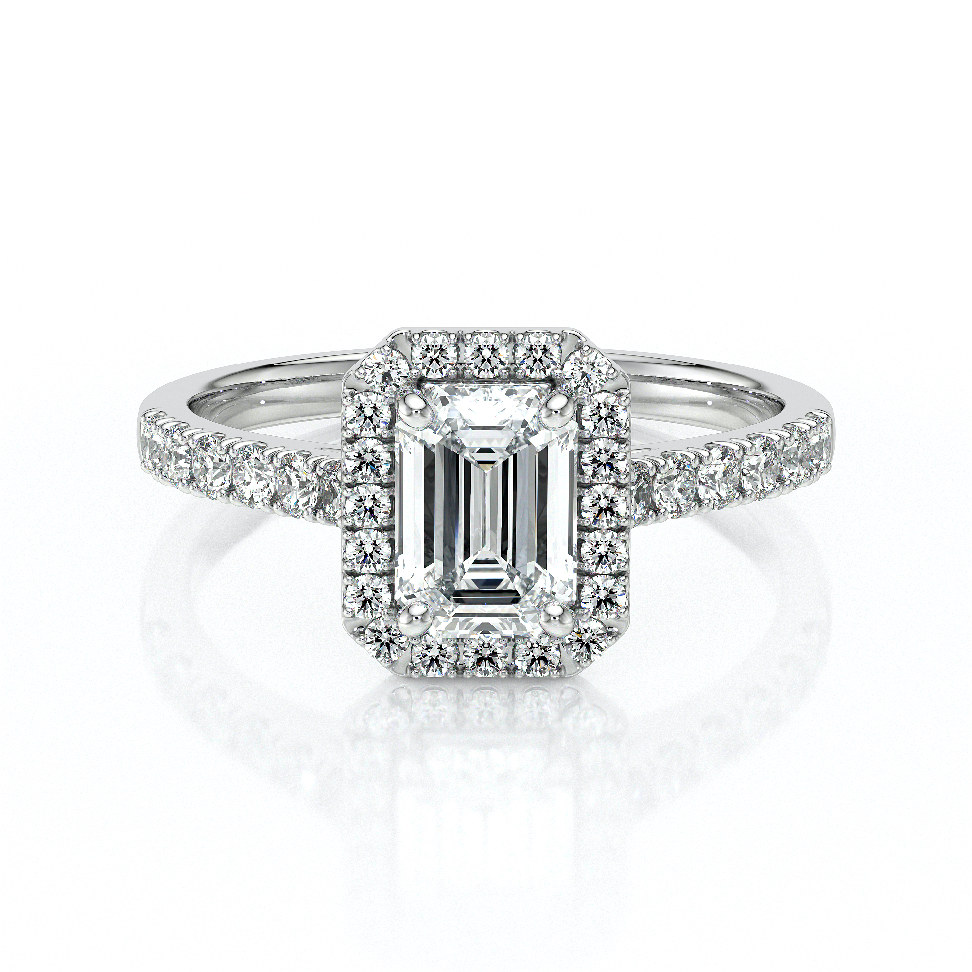 Bague en diamant avec un motif émeraude en centre, entouré de petites pierres scintillantes sur un anneau en or blanc, illustrant l'élégance et le luxe parfaits pour une demande en mariage ou une occasion spéciale. Modèle + diamant.