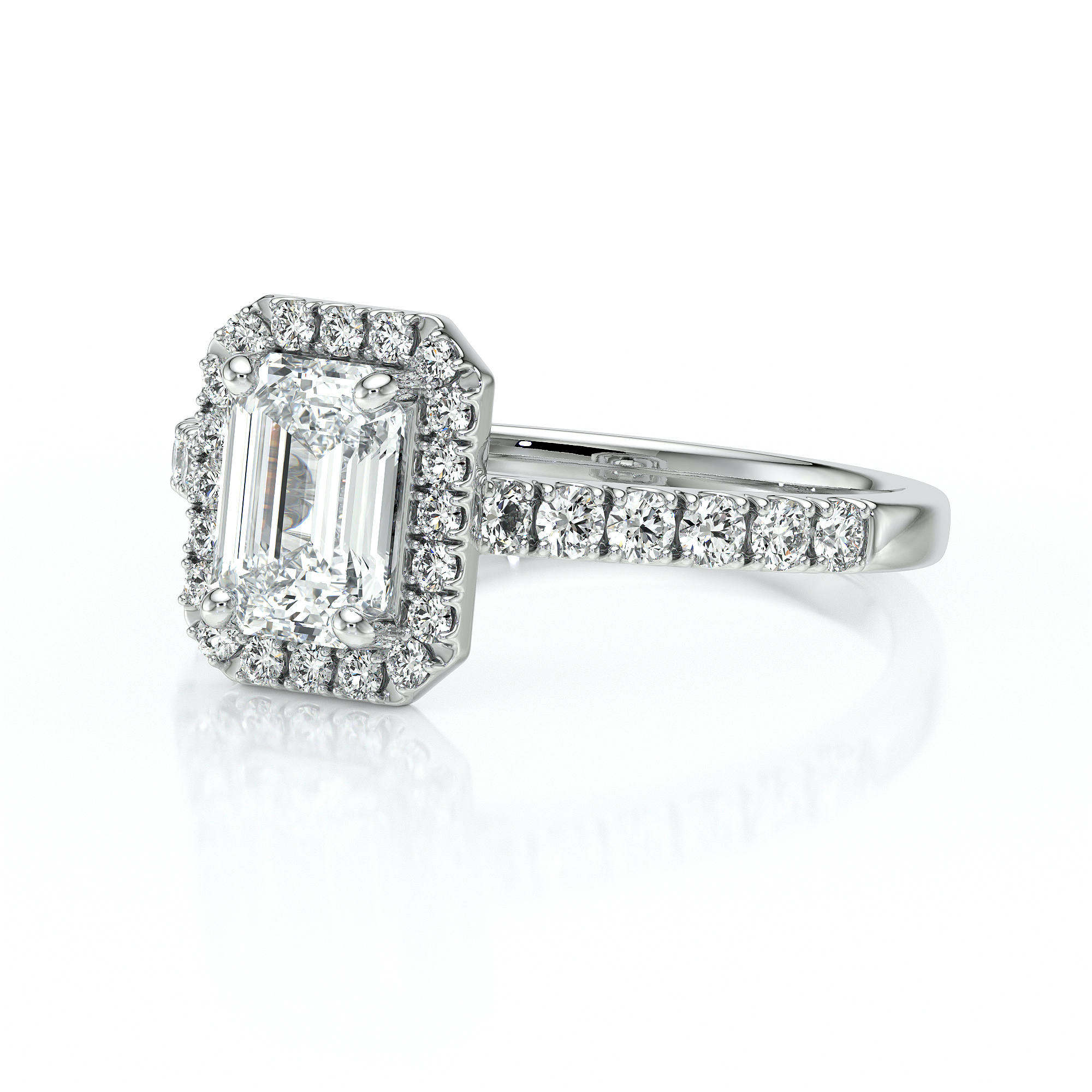 Bague en diamants avec un coussin central en forme d'émeraude, entourée de petits diamants scintillants, la monture est en or blanc, idéale pour une demande en mariage ou une occasion spéciale. Cette bague combine élégance et luxe, mettant en valeur des pierres précieuses de haute qualité dans un design raffiné.