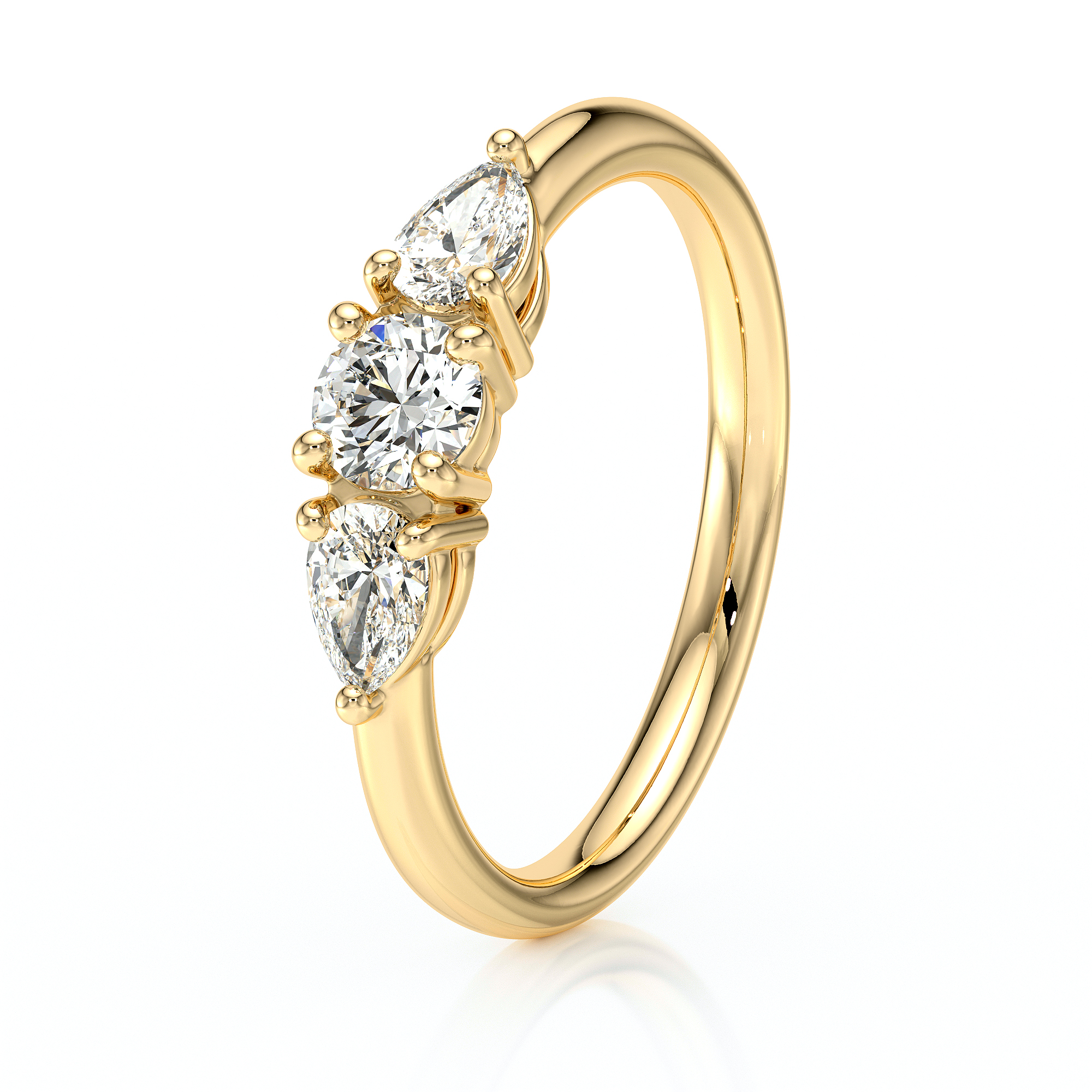 Bague avec trois diamants un rond et deux en poire sertis sur une monture en or 18 carats jaune