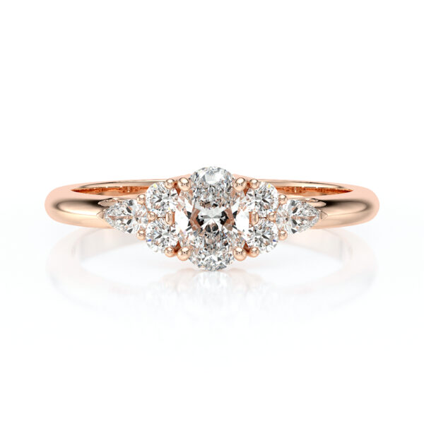 Solitaire épaulé bague diamant ovale, diamant poire et diamant rond or rose 18 carats