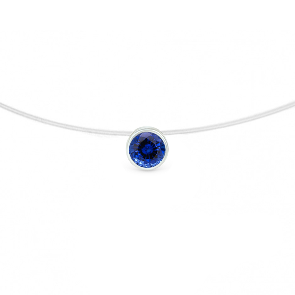 Collier élégant avec un pendentif en diamant bleu rond, monté sur un fil argenté, parfait pour les occasions spéciales et la mode quotidienne, ajoutant une touche de sophistication à votre style.
