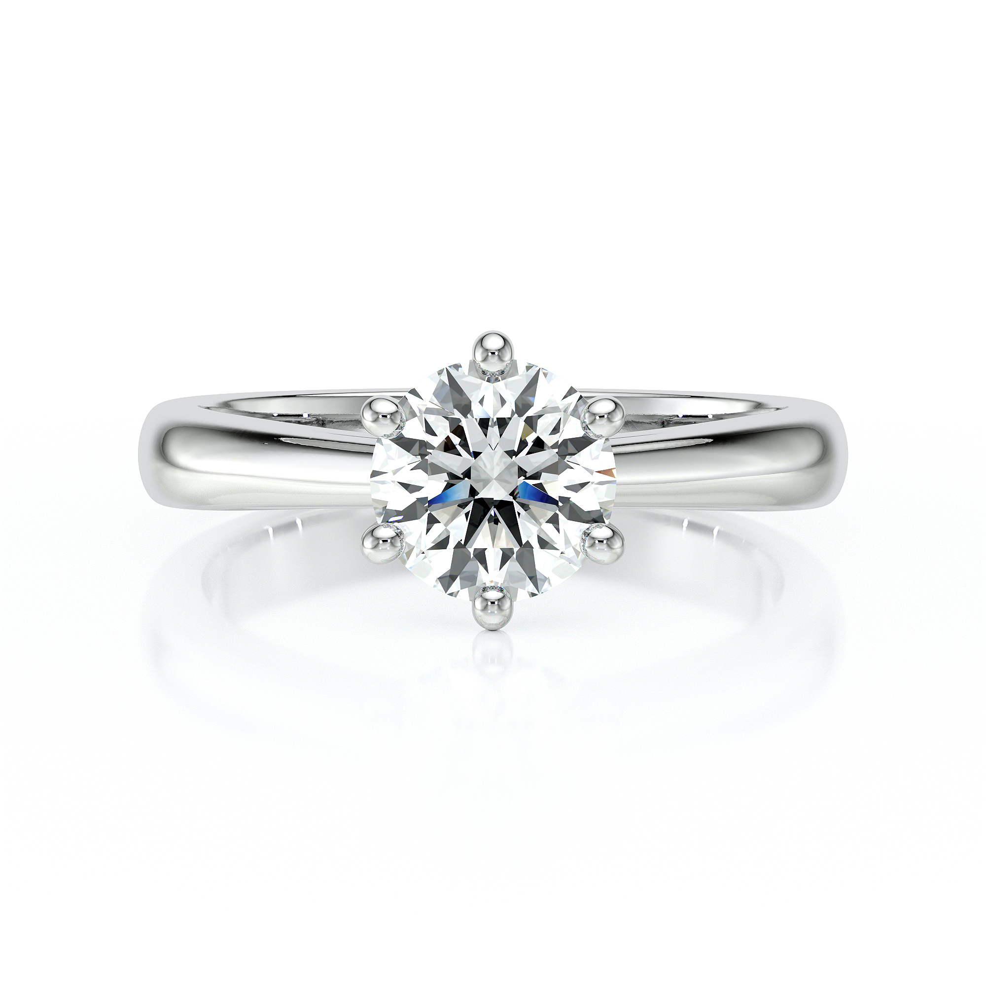 Bague en or blanc avec un diamant rond brillant, serti en prongs, mettant en valeur un éclat scintillant, idéale pour une demande en mariage ou une occasion spéciale, modèle élégant et intemporel.