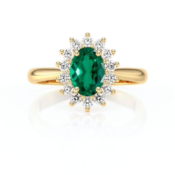 Bague en or avec une pierre précieuse verte ovale entourée de diamants scintillants, offrant un design élégant et raffiné, parfaite pour des occasions spéciales ou comme bague de fiançailles.