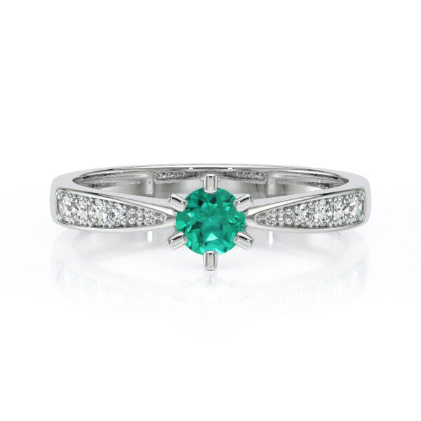 Bague en argent avec une pierre précieuse turquoise entourée de diamants, modèle élégant et moderne, idéale pour une demande en mariage ou une occasion spéciale, mettant en valeur le contraste entre la pierre centrale et les détails scintillants.