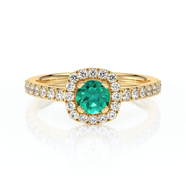Bague en or avec un élégant diamant entouré d'un halo de zircons, mettant en valeur une belle pierre turquoise au centre. Idéale comme bague de fiançailles ou pour une occasion spéciale, cette pièce artisanale allie sophistication et éclat, parfaite pour un cadeau mémorable.