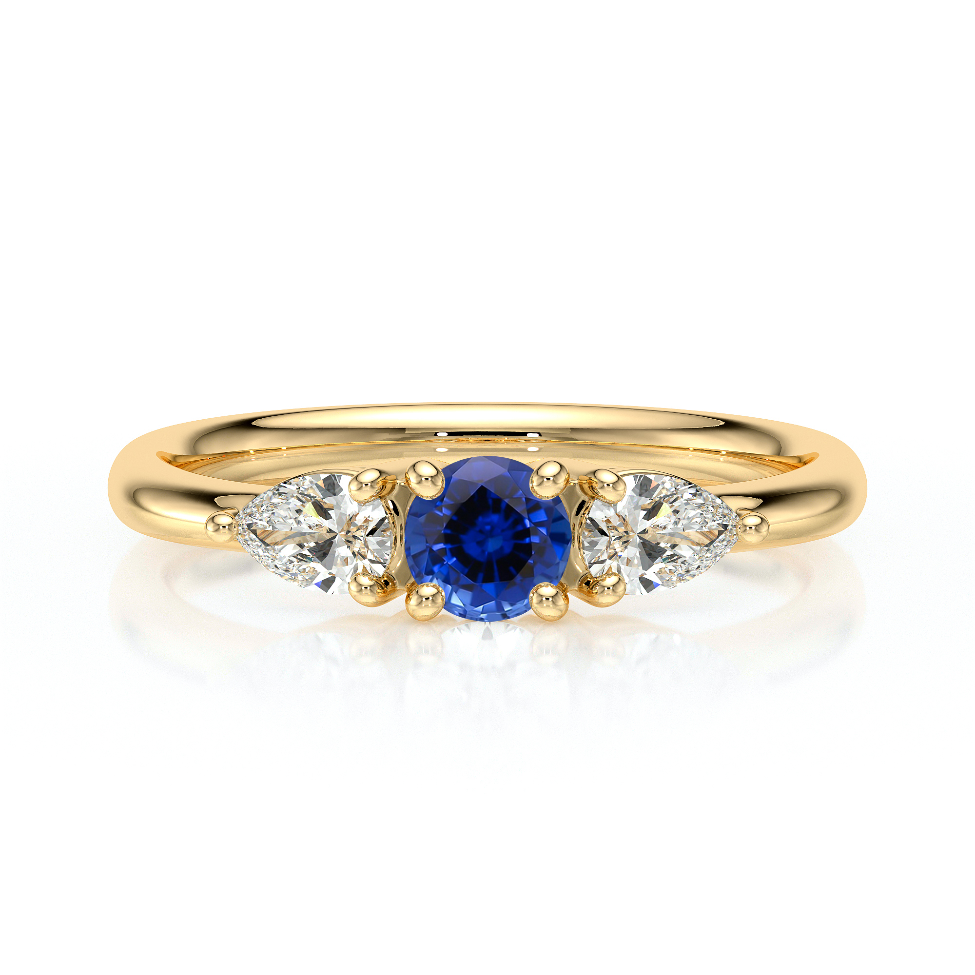 Bague en or avec un saphir central bleu accompagnée de deux diamants en forme de poire, alliant élégance et sophistication. Parfaite pour une demande en mariage ou comme bijou de luxe. Modèle unique avec une brillance exceptionnelle et un style intemporel.