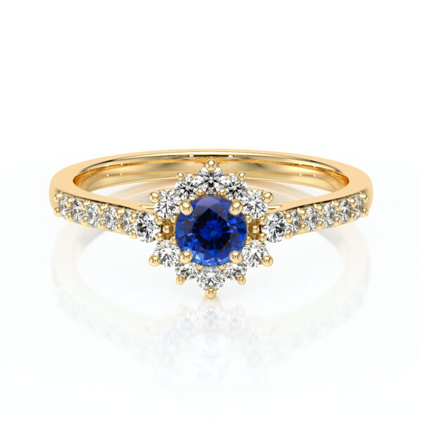 Bague en or élégante avec une pierre précieuse bleu en forme de fleur, entourée de diamants scintillants. Idéale pour les fiançailles ou comme bijou de luxe, cette bague en or combine sophistication et éclat, illustrant un design intemporel et romantique.