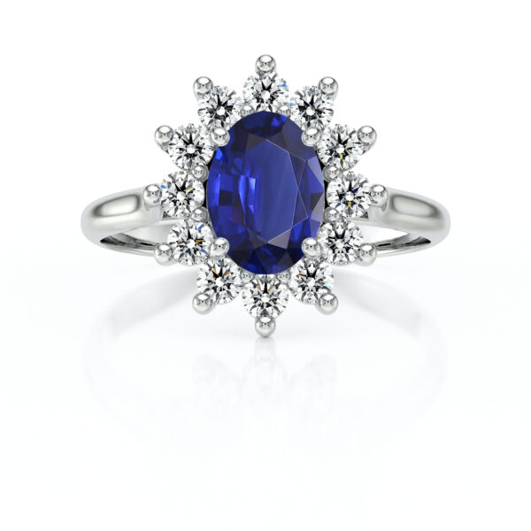 Bague en argent sertie d'une pierre précieuse ovale bleue entourée de diamants scintillants, parfaite pour un cadeau ou un moment spécial. Elle allie élégance et sophistication, idéale pour les fiançailles ou les anniversaires.