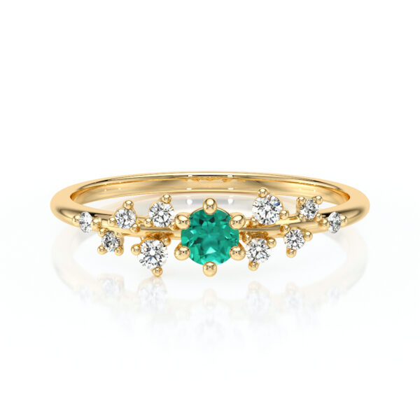 Bague en or avec un design élégant, ornée d'un cristal vert en son centre entouré de diamants scintillants, idéale pour les fiançailles ou les occasions spéciales, modèle unique avec diamant.