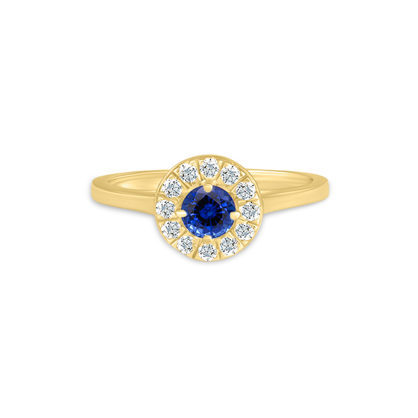 Bague en or jaune avec un magnifique saphir bleu central entouré de diamants en forme de cercle. Cette élégante bijou arbore un design classique, idéale pour fiançailles, occasions spéciales ou comme statement de mode. Modèle + diamant.