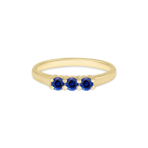 Bague en or jaunâtre avec trois diamants saphir ronds de couleur bleue, modèle élégant et intemporel, parfaite pour les fiançailles, les anniversaires ou comme bijou de tous les jours.