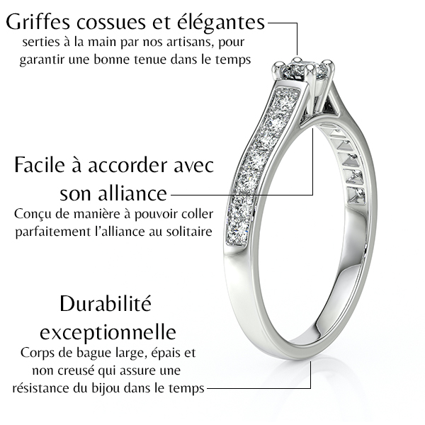 Bague de fiançailles élégante avec griffes cossues et raffinées, ornée de diamants brillants, conçue pour s'accorder facilement avec une alliance. La durabilité exceptionnelle est assurée par un corps de bague large et épais, garantissant la résistance du bijou dans le temps.