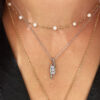 collier-trilogie-diamant-pince-porte-or-blanc-18-carats